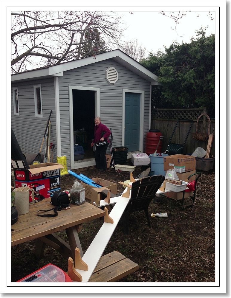 Frame_Gloria cleaning the garden shed 2013